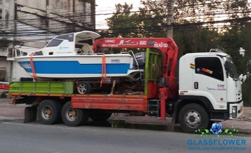 the speed boat is moving by hiab truck-1
